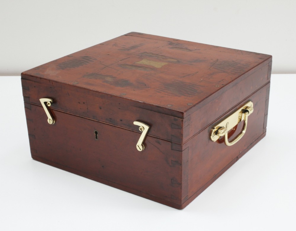An early twentieth-century barocyclonometer housed in a hinged mahogany box, featuring a circular brass typhoon barometer in the lower section and a directional cyclone dial mounted in the upper lid. View VII
