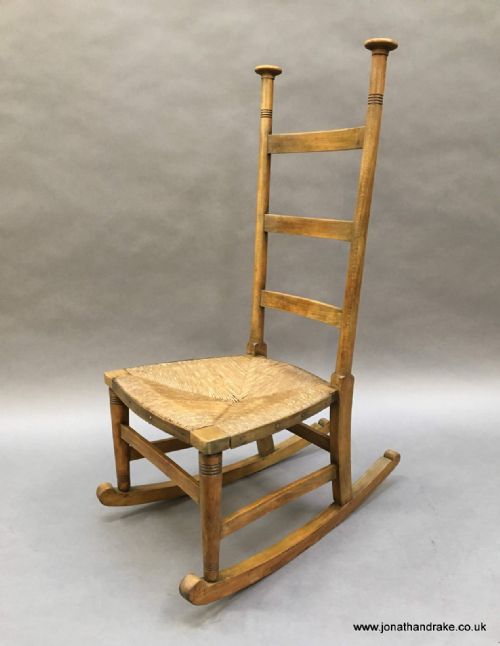 Arts and Crafts Rocking Chair by Libertys