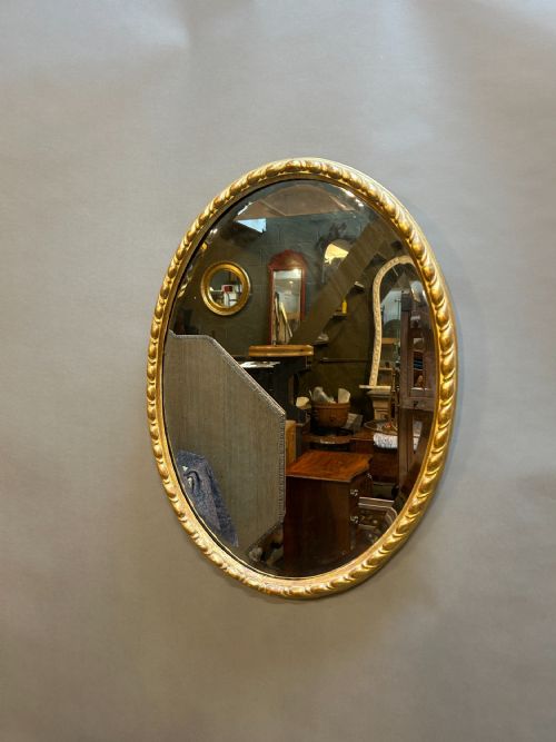 C19TH GILT OVAL WALL MIRROR
