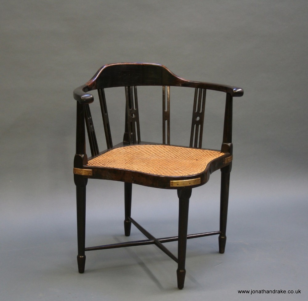 colonial elbow corner chair, ebonised nineteenth century