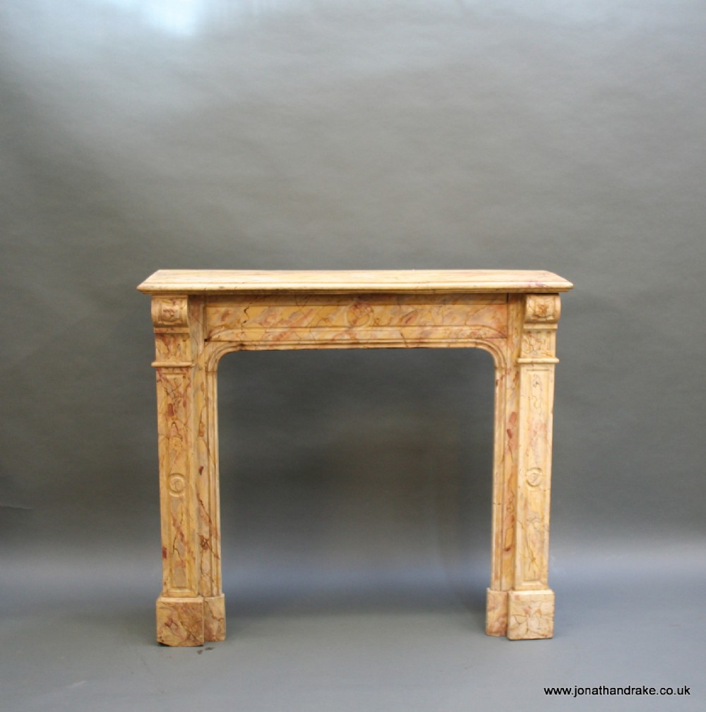Early C19th faux marble fire surround