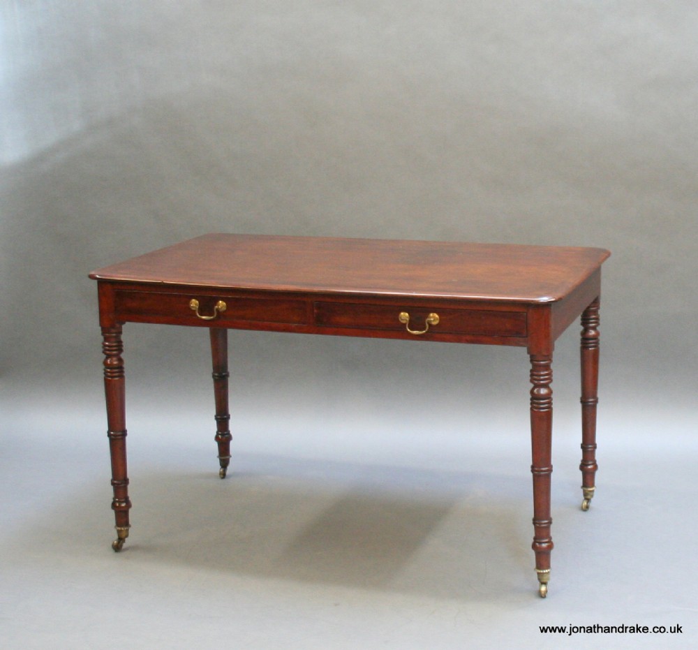 George 1V mahogany writing table
