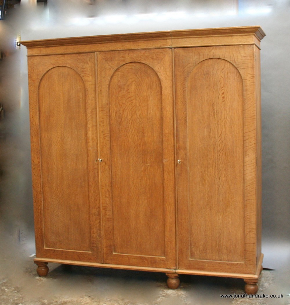C19th oak wardrobe attributed Holland & Son