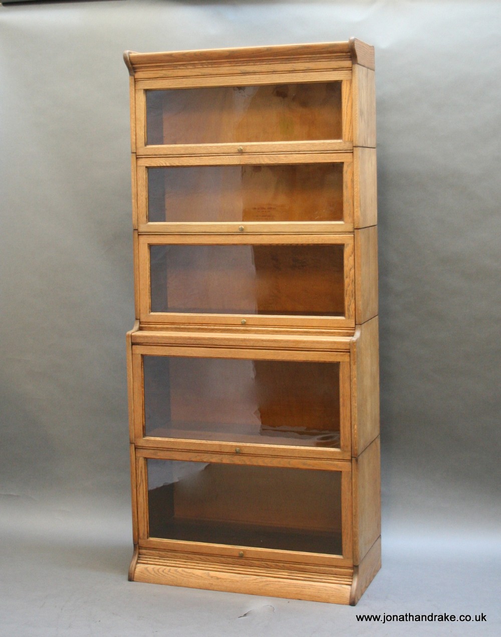 Large globe Wernicke type bookcase by Gunn