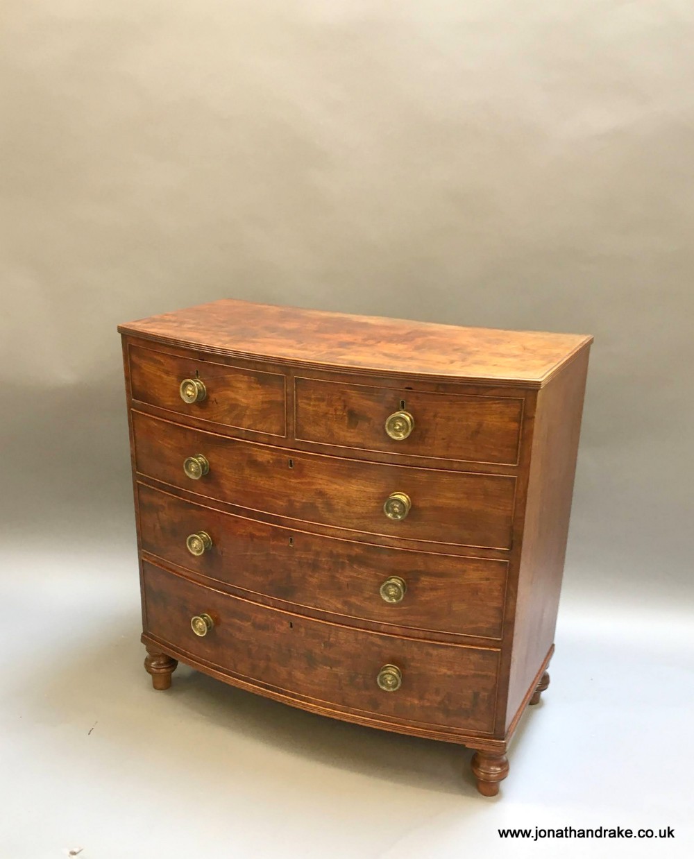 Regency bow fronted chest of drawers