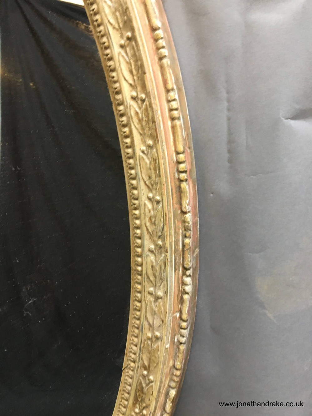 C19th ornate oval overmantle mirror View V