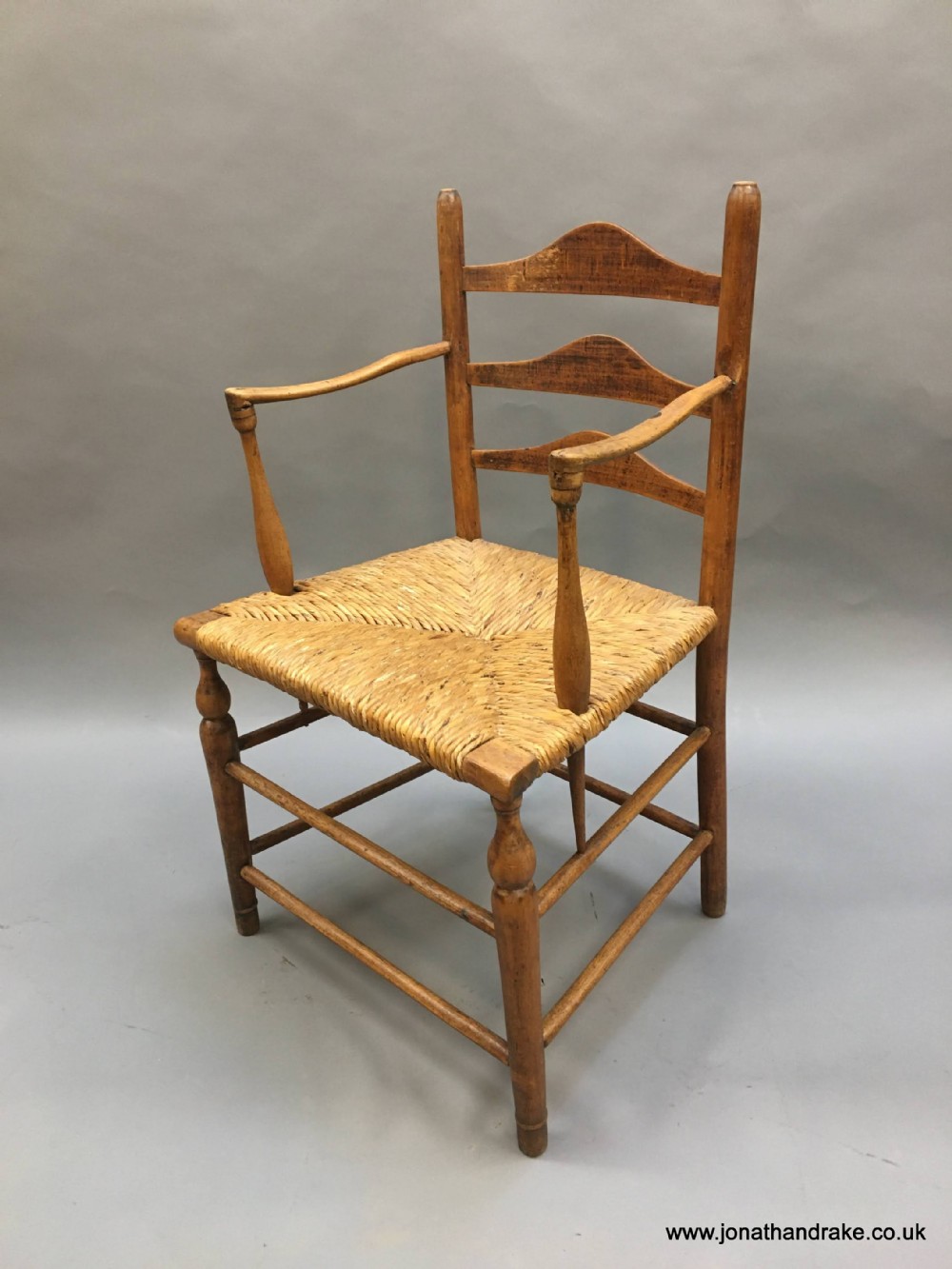 Early C19th country chair, stamped