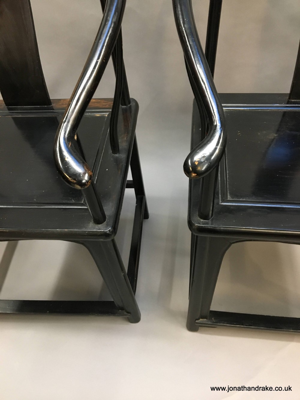 Pair Chinese ebonised horseshoe chairs View X