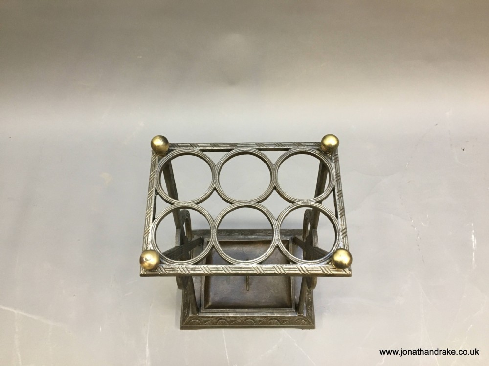 Aesthetic stick stand, manner of Dresser View V