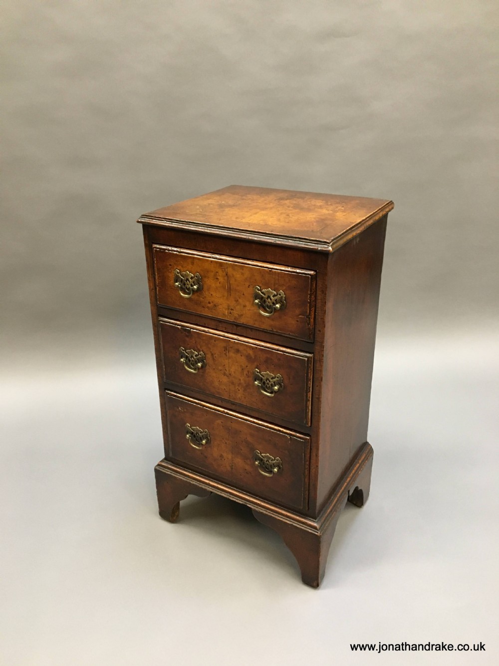 Georgian Revival walnut small chest