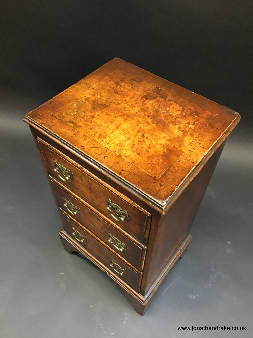 Georgian Revival walnut small chest View II