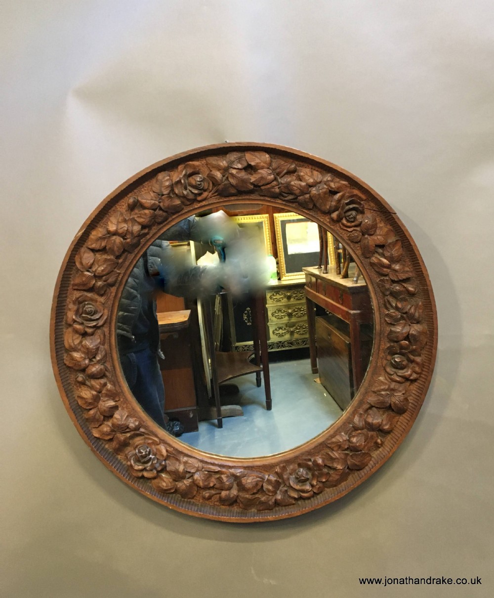 Carved wall mirror