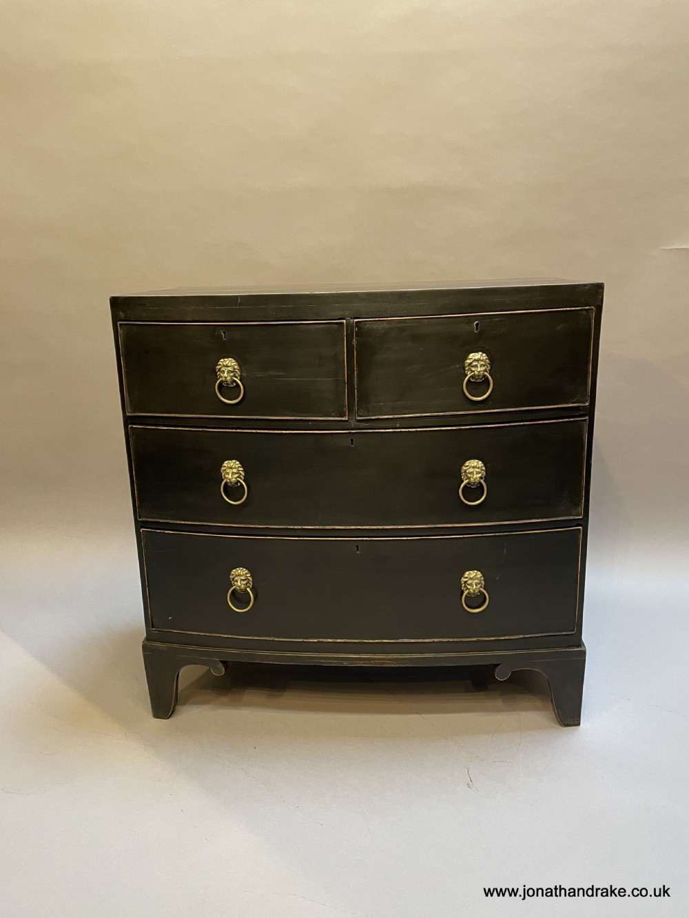 Regency ebonised chest of drawers View II