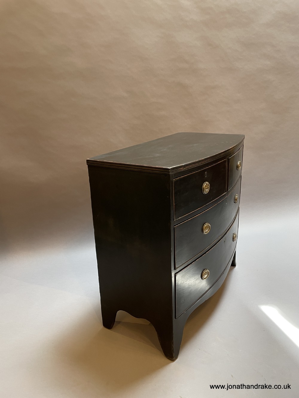 Regency ebonised chest of drawers View V