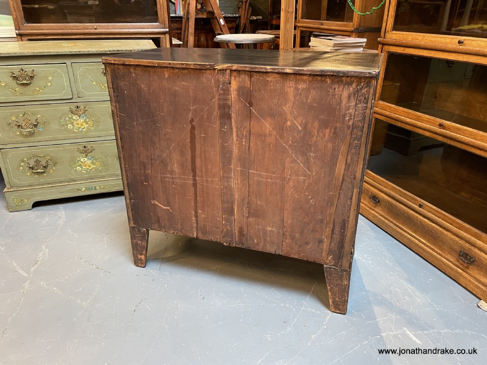 Regency ebonised chest of drawers View VIII