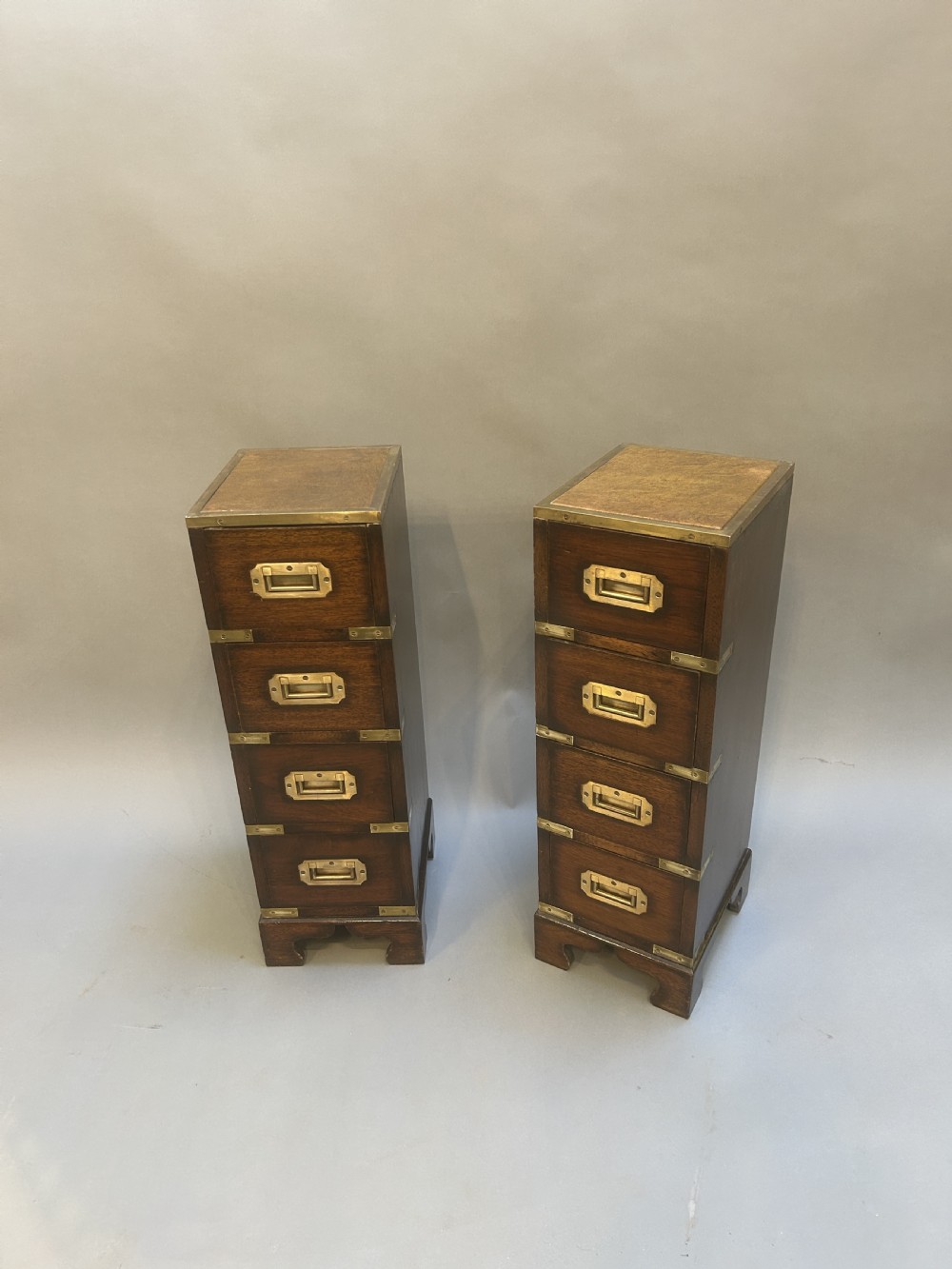 Pair campaign bedside chest of drawers