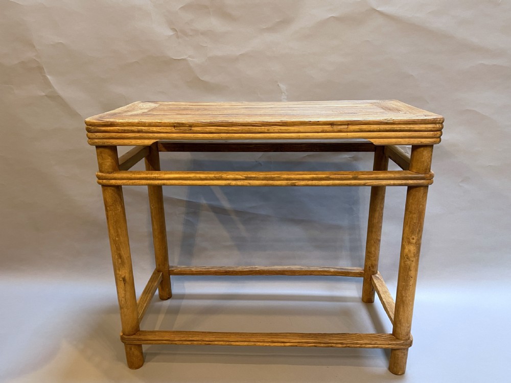 A 19th-century Chinese rectangular elm side table with double stretchers, natural wood grain, and straight cylindrical legs. View II
