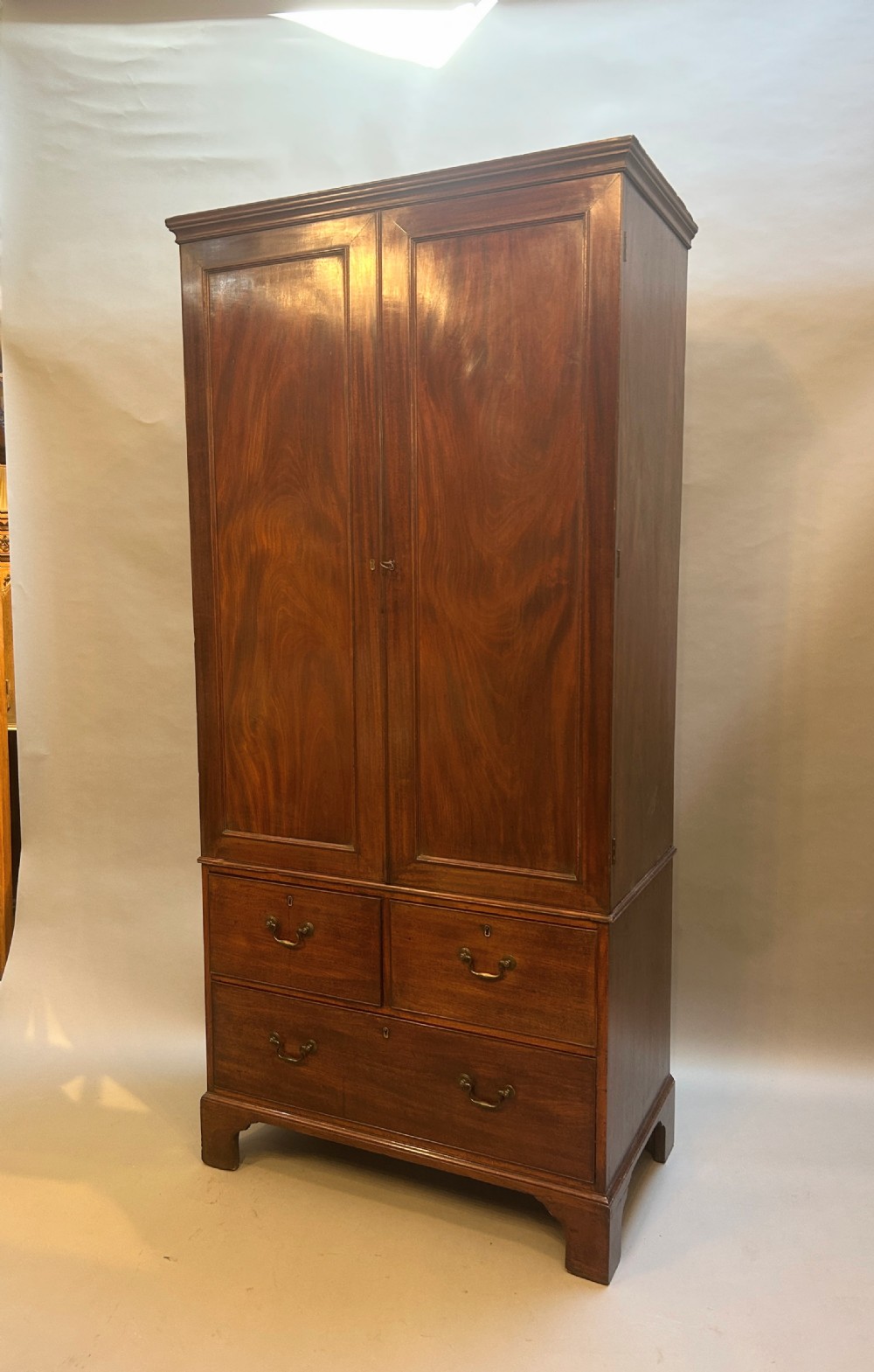 Antique George III Mahogany Linen Press Of Narrow Proportions
