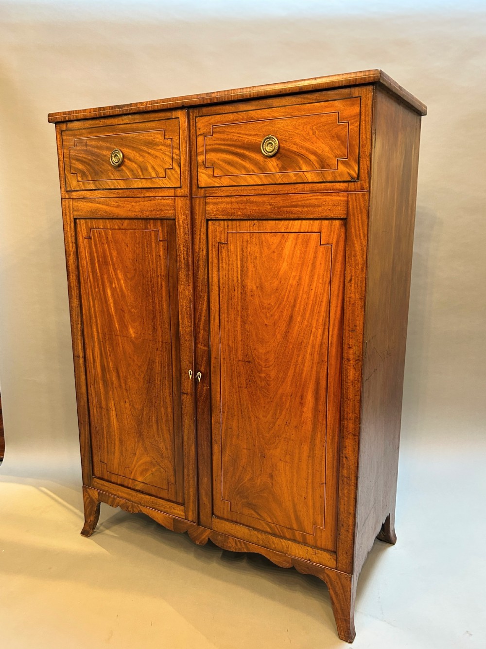 George III mahogany wardrobe of small proportions