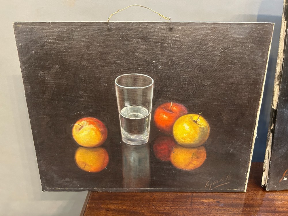 A pair of Spanish still-life oil paintings depicting apples, a pewter plate, and a glass of water against a dark background. View III