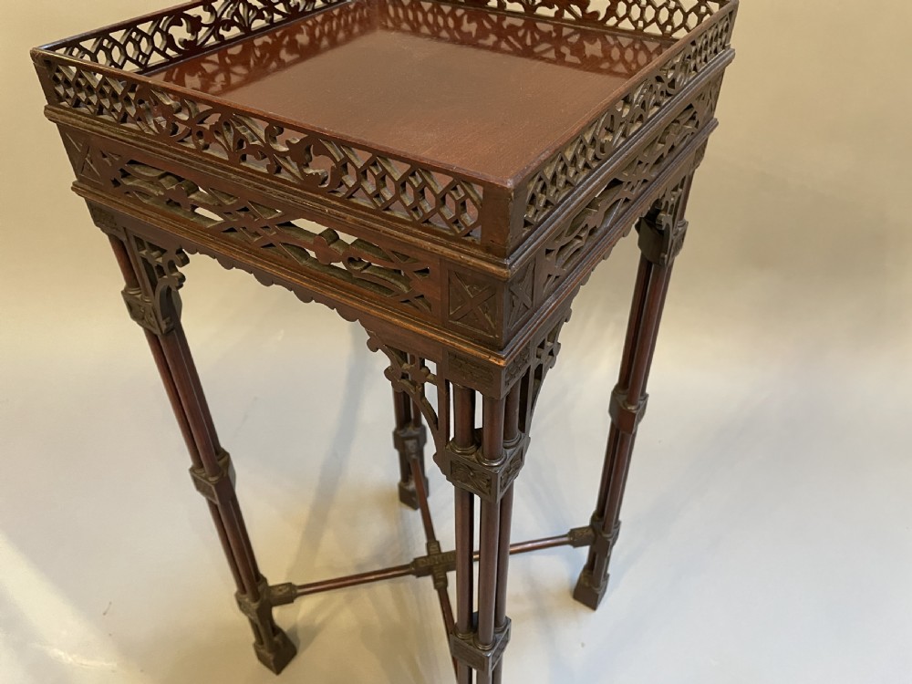 A tall mahogany Chippendale revival lamp table featuring a pierced fretwork gallery top, clustered column legs, and an X-form stretcher. View II