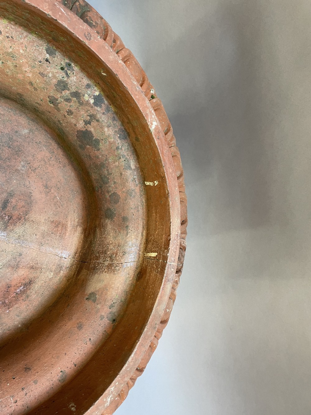 A pair of weathered terracotta Campana garden urns featuring wide egg-and-dart rims, gadrooned lower bowls, fluted stems, and square bases. View XI