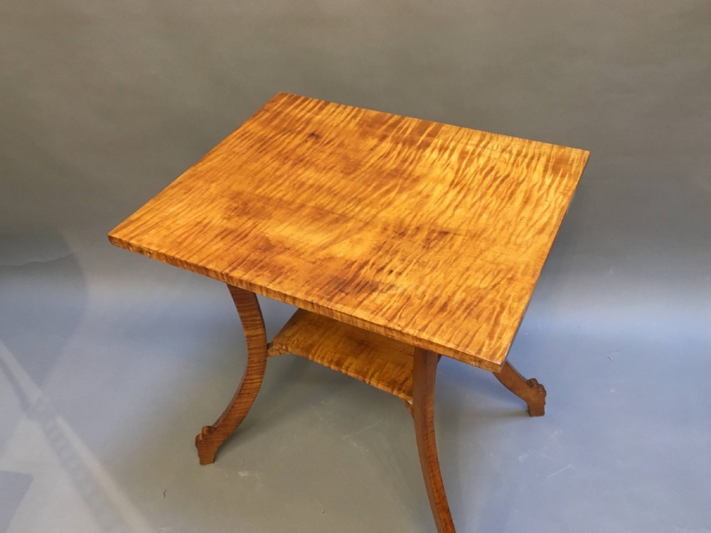 An Art Deco golden Karelian birch side table featuring a square top, lower tier shelf, and flared outward curved legs. View III
