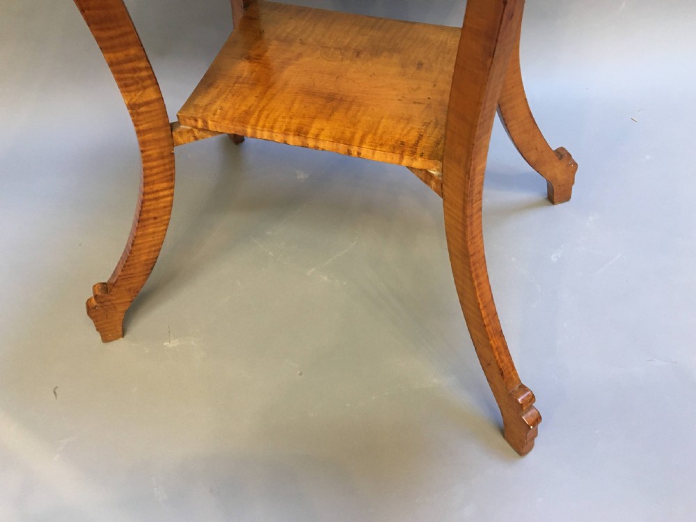 An Art Deco golden Karelian birch side table featuring a square top, lower tier shelf, and flared outward curved legs. View IV