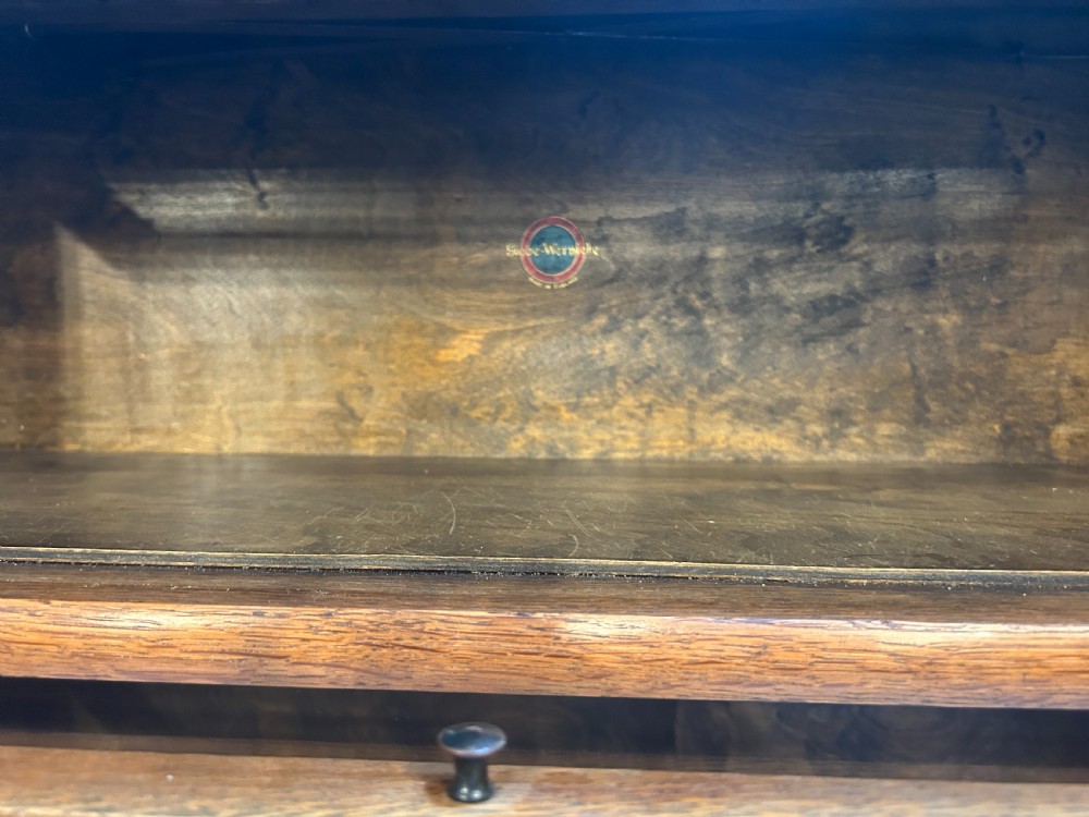 A tall five-tier oak Globe Wernicke stacking bookcase with glazed up-and-over doors and a base drawer. View IV