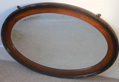 Edwardian Oak Framed Oval Wall Mirror
