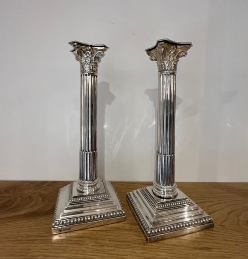 Pair of Edwardian (1905/6) Silver Corinthian Column Candlesticks