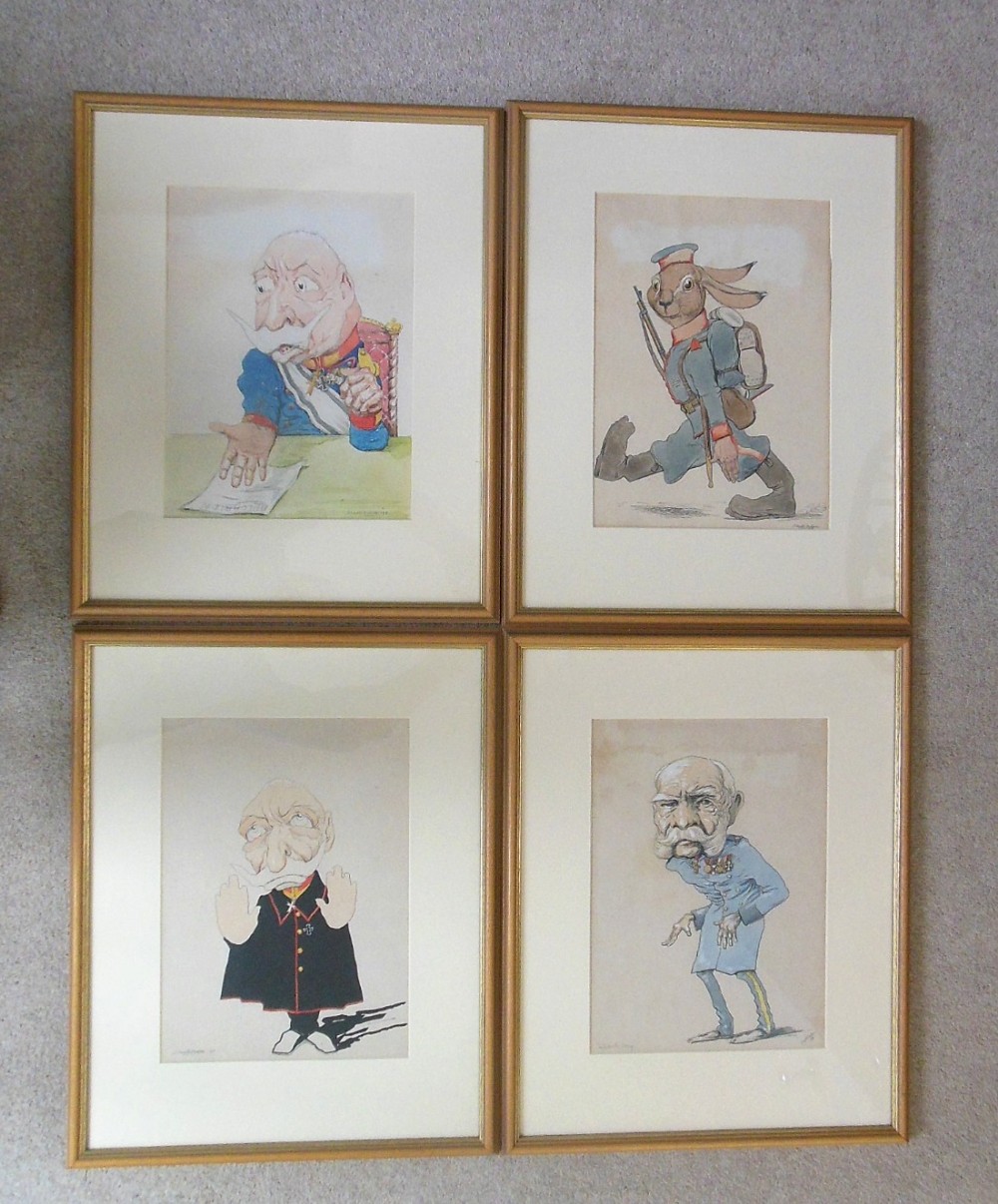 A set of four framed satirical caricatures depicting First World War figures, presented in slim gold wooden frames with cream mounts.