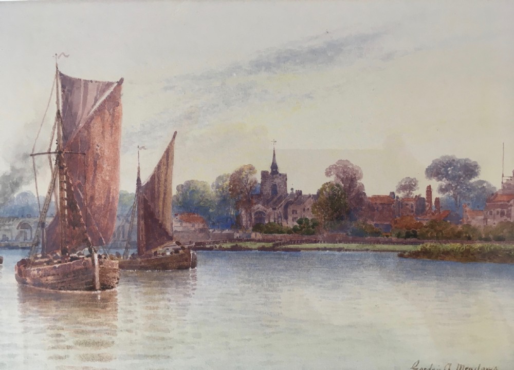 A pair of horizontally framed watercolour paintings depicting Thames sailing barges on calm water, enclosed in matching gilt frames with double mounts. View V