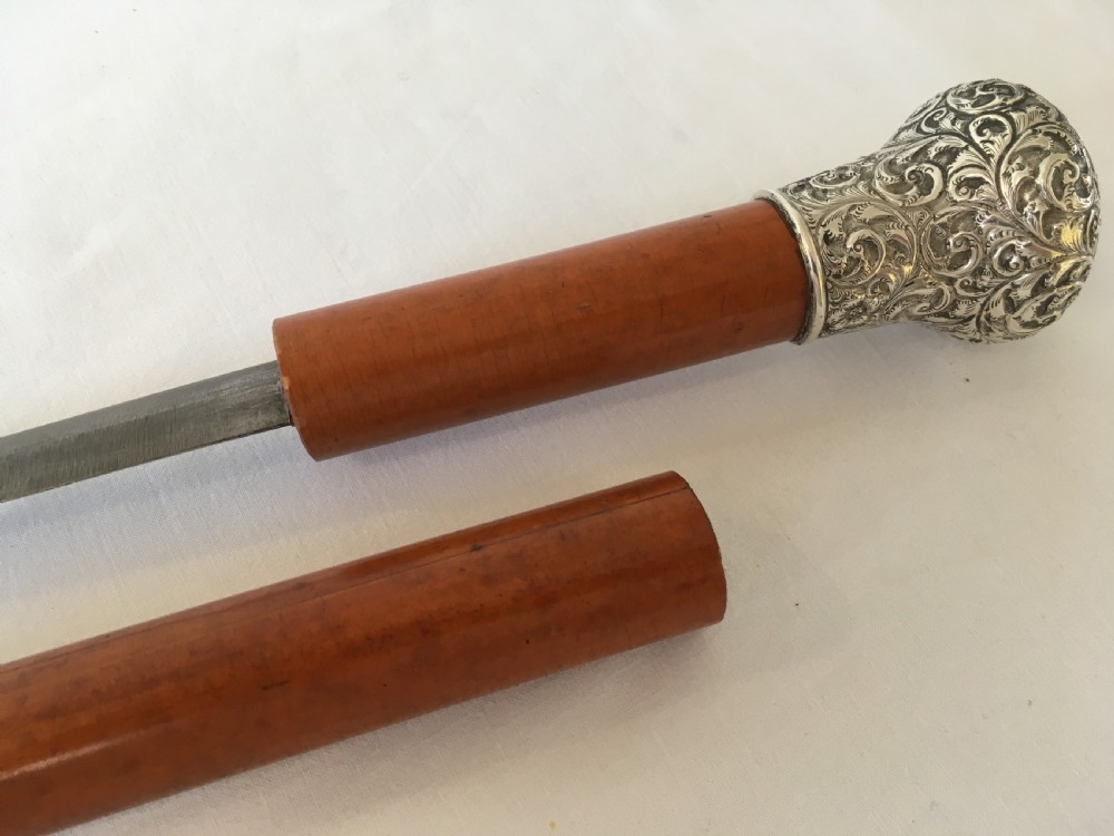 Malacca and Silver Mounted Sword Stick View X