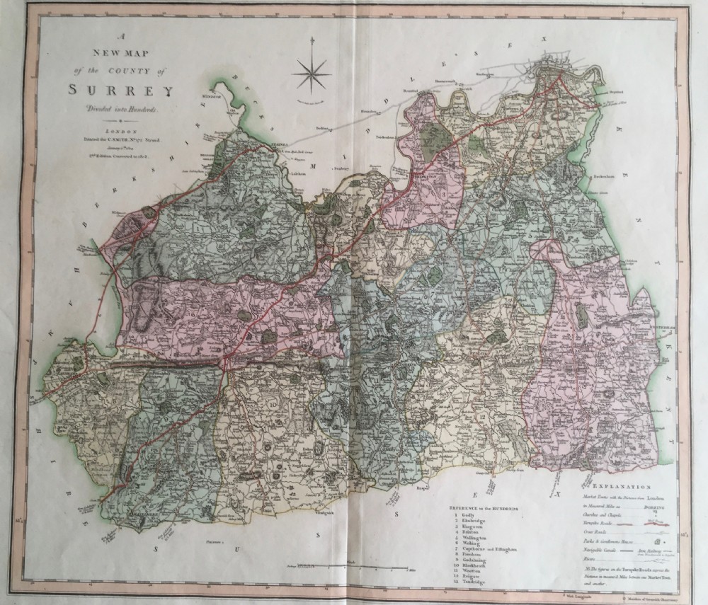 An engraved 1808 hand-coloured map of Surrey by C. Smith, mounted within a broad cream mat board. View V