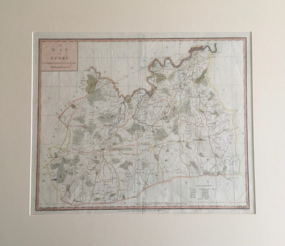 An 18th-century hand-coloured copperplate engraved map of Surrey by J. Harrison dated 1788, mounted on an off-white background.