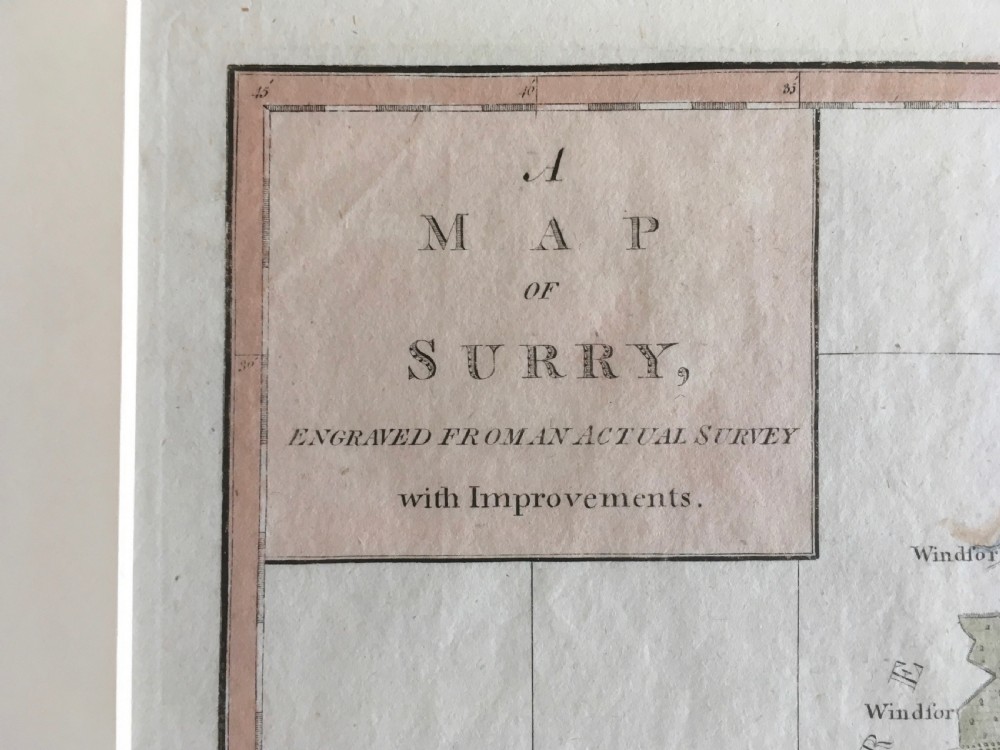 An 18th-century hand-coloured copperplate engraved map of Surrey by J. Harrison dated 1788, mounted on an off-white background. View II