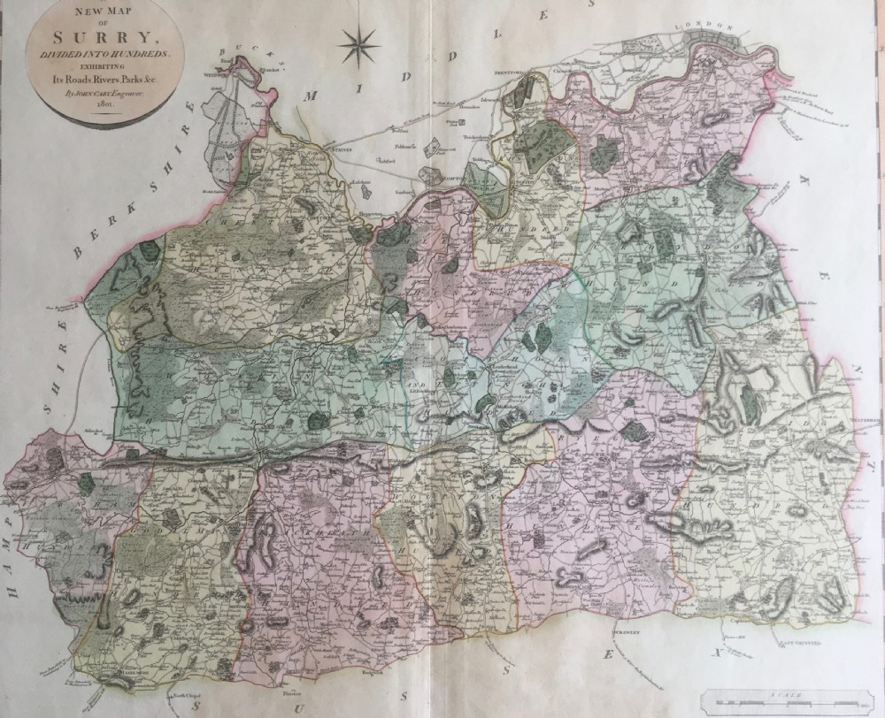 An antique hand-coloured engraved map of Surrey by John Cary, dated 1801, presented on a cream mount with an oval title cartouche. View V