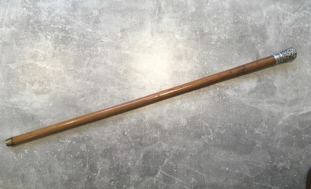 Late 19th Century Malacca Sword Stick with Silver Repousse Handle View II