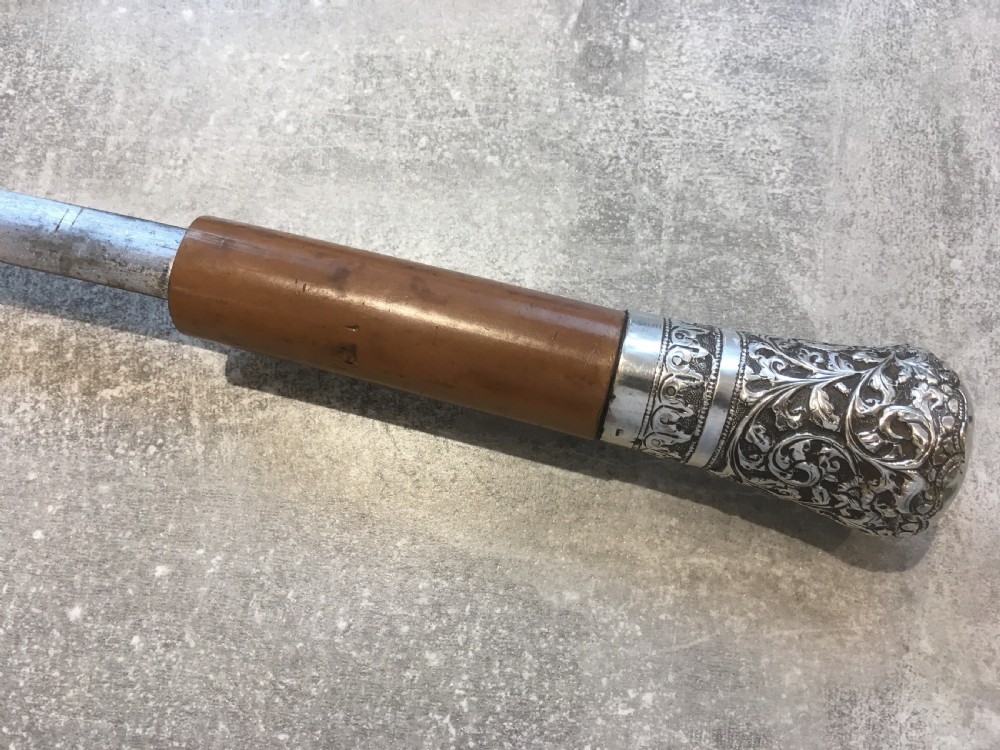 Late 19th Century Malacca Sword Stick with Silver Repousse Handle View III