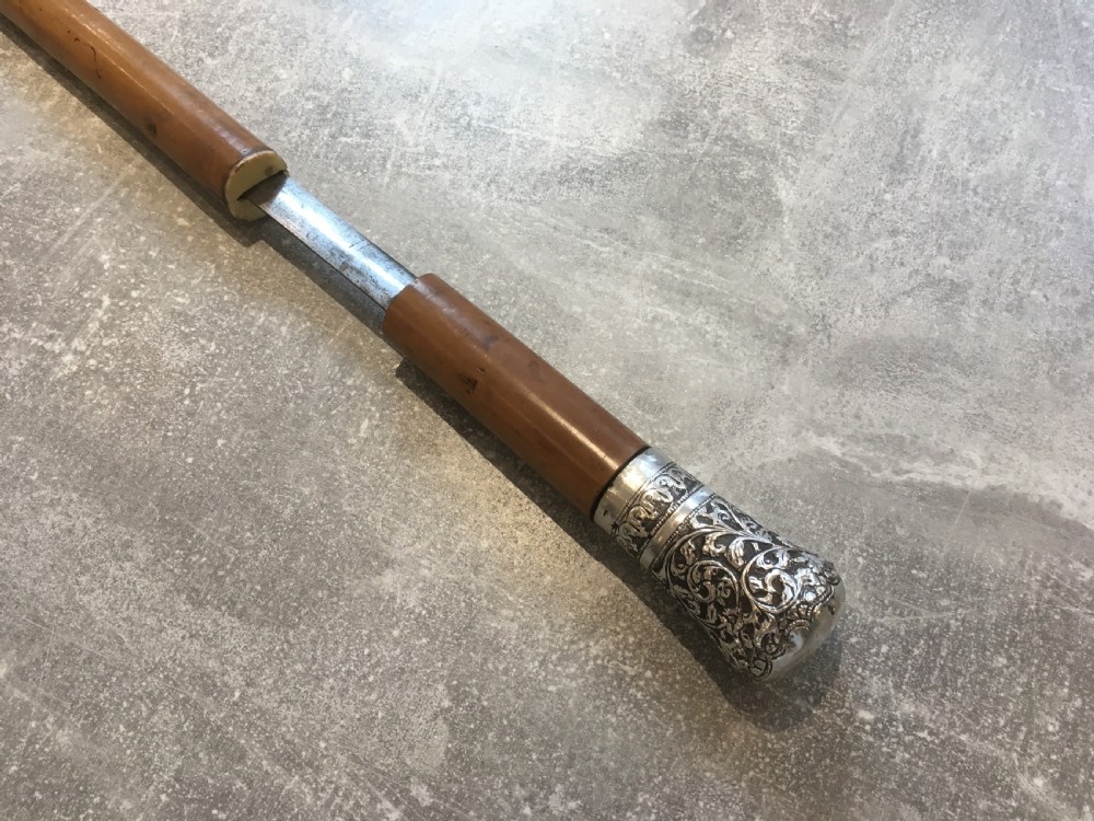 Late 19th Century Malacca Sword Stick with Silver Repousse Handle View VI