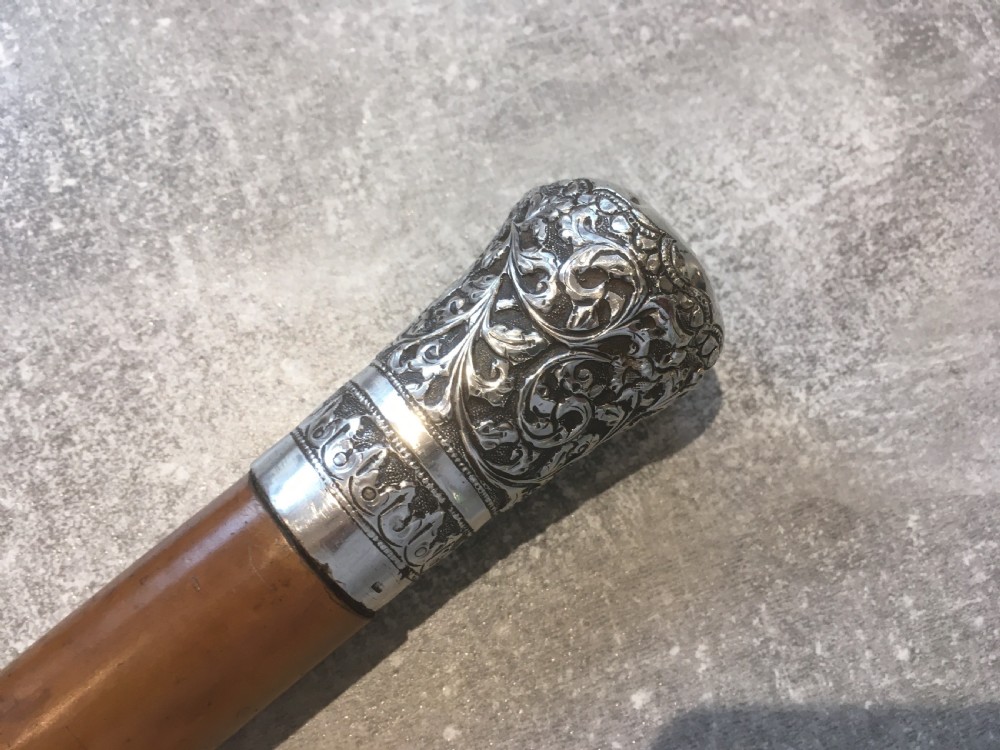 Late 19th Century Malacca Sword Stick with Silver Repousse Handle View X