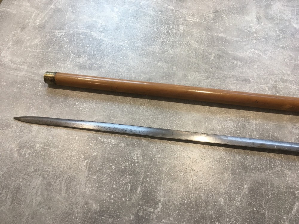 Late 19th Century Malacca Sword Stick with Silver Repousse Handle View XII