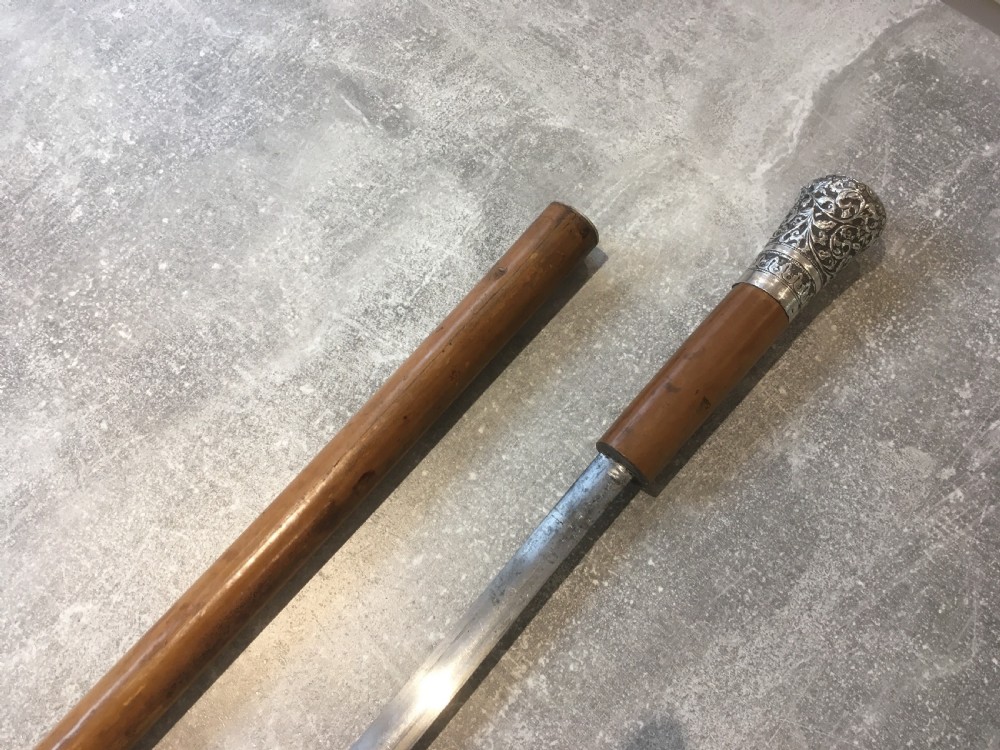 Late 19th Century Malacca Sword Stick with Silver Repousse Handle View XIII