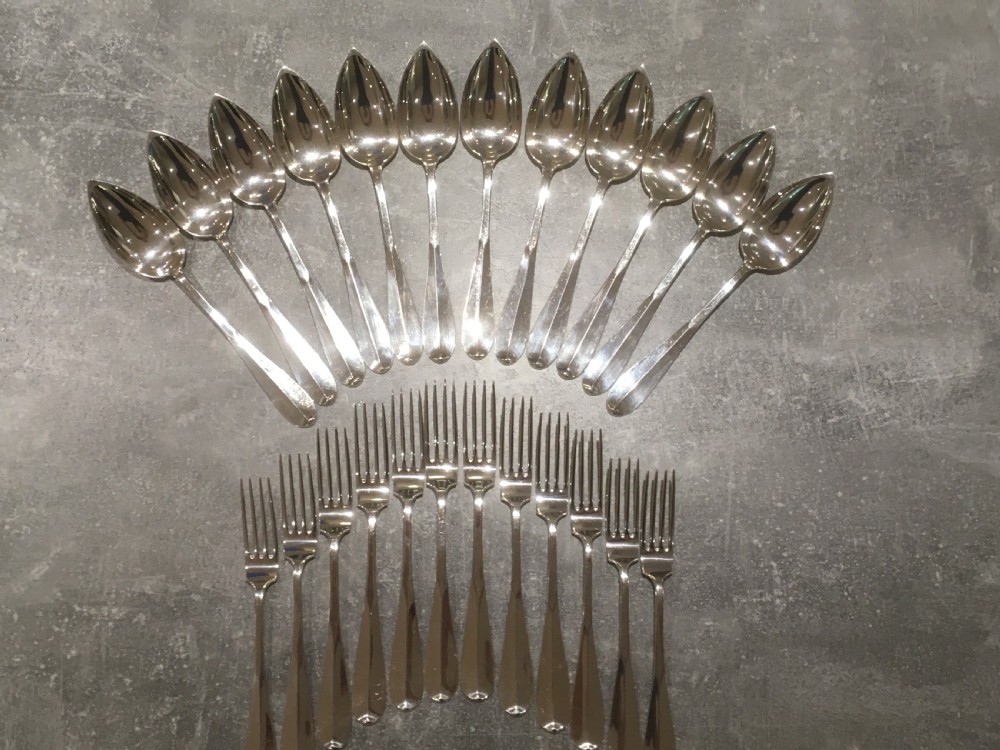 Cased Set of Twelve Silver Forks and Spoons
