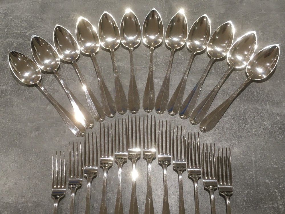 Cased Set of Twelve Silver Forks and Spoons View III