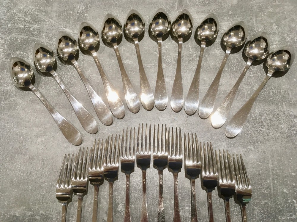 Cased Set of Twelve Silver Forks and Spoons View V