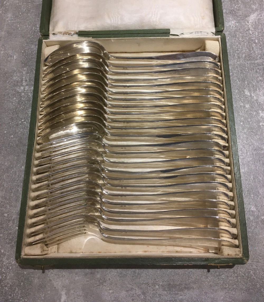 Cased Set of Twelve Silver Forks and Spoons View XII