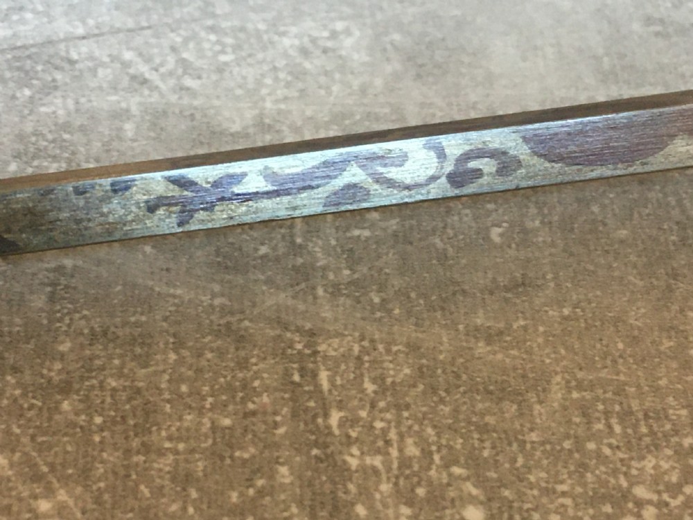 An antique Malacca wood walking stick featuring a carved stag antler handle and silver collar, drawn to reveal a long steel concealed blade. View VIII
