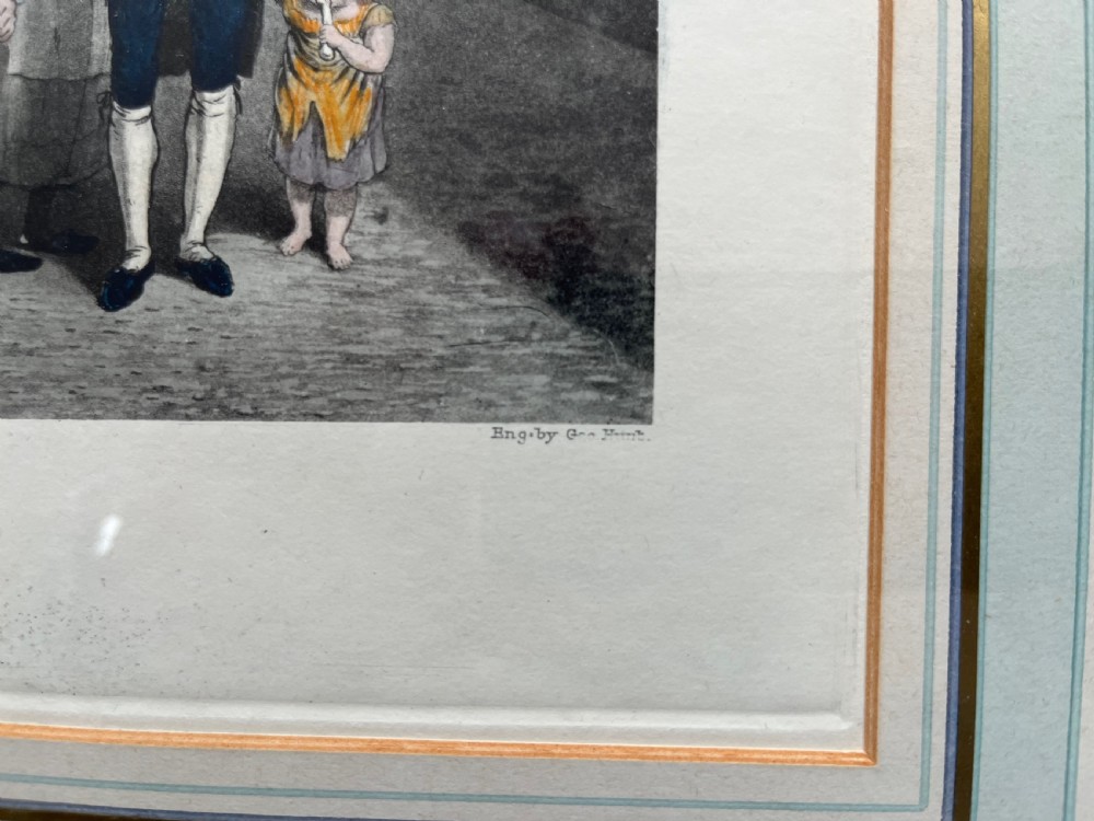 Framed hand-coloured nineteenth-century print depicting figures playing rackets in a prison courtyard. View IV